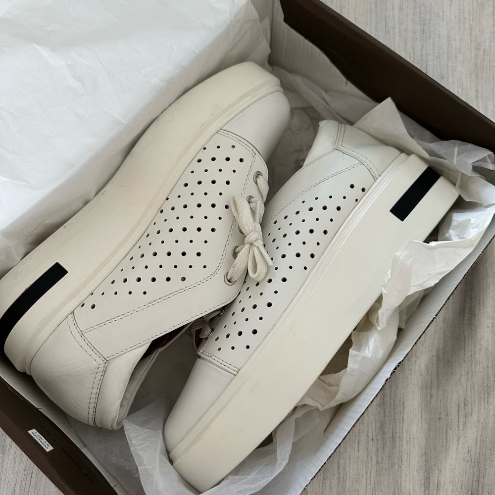 Almost new Paolo Kendra white leather sneakers worn once in original box.